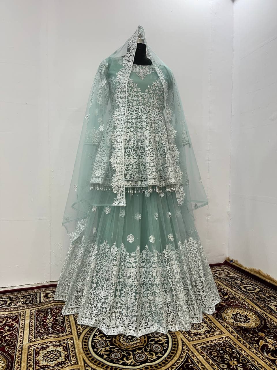 Aqua Salwar Suit In Butterfly Mono Net With Embroidery Work