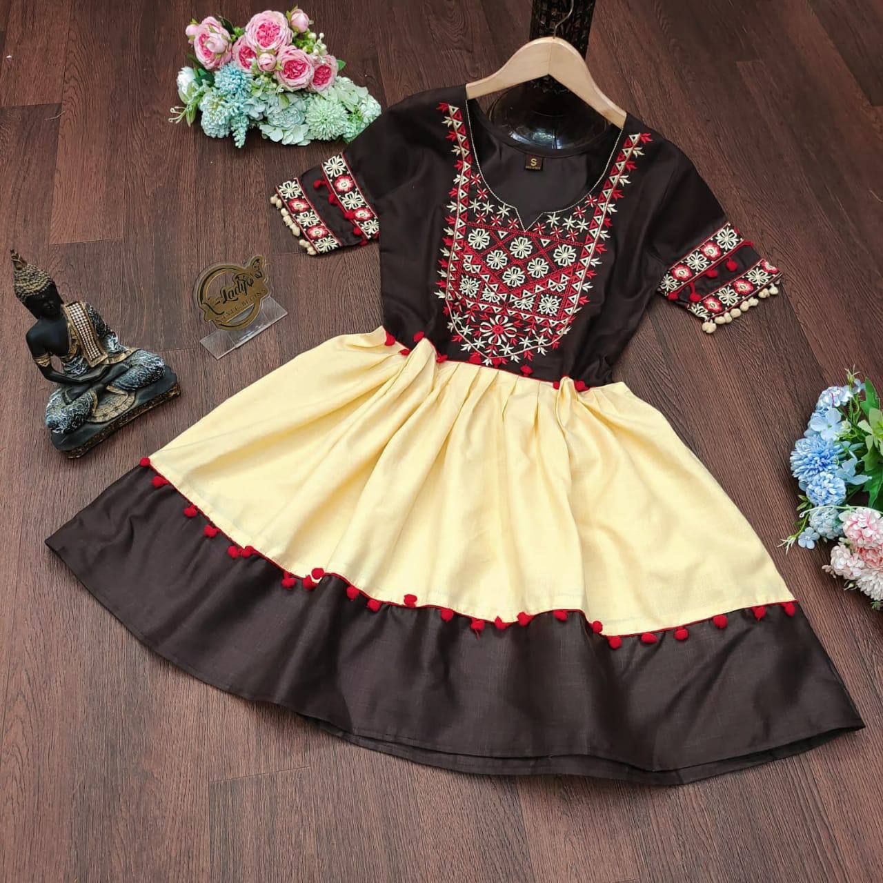 Black,Yellow Kurti In Slub Cotton With Embroidery Work