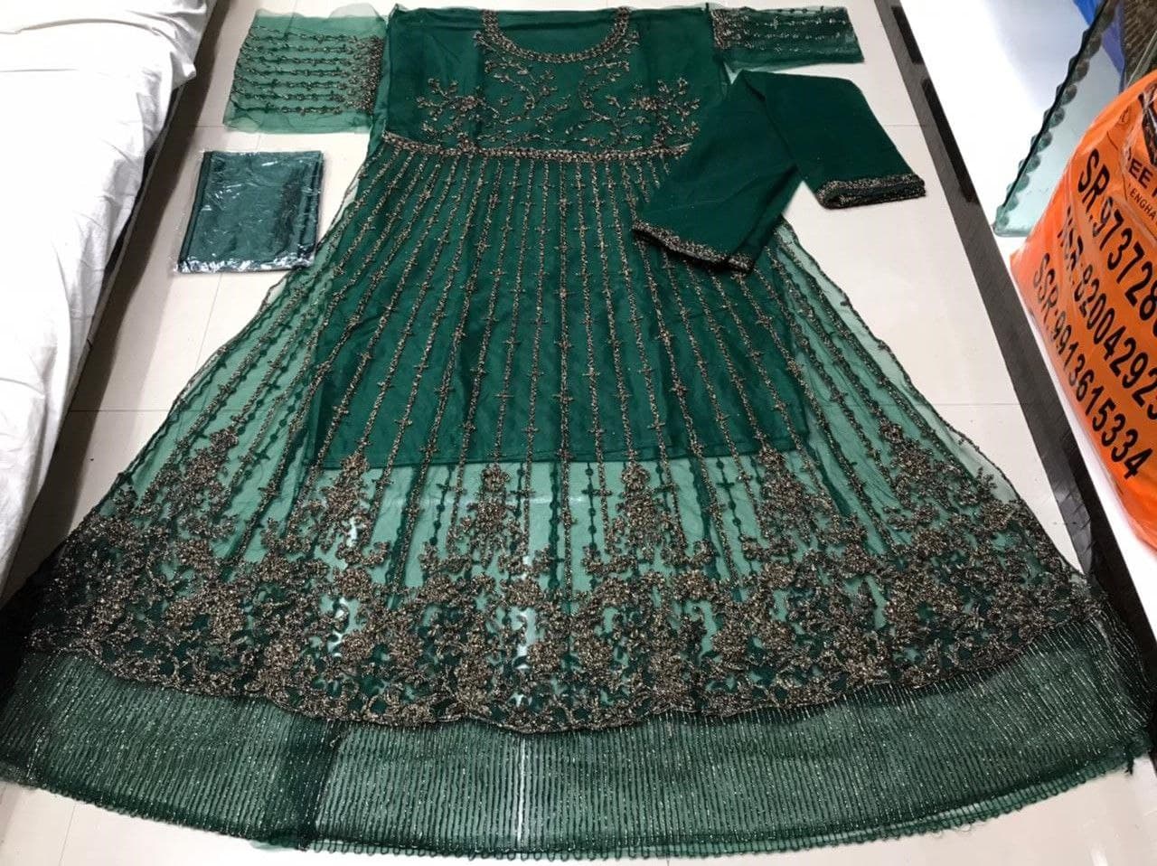 Bottle Green Gown In Butterfly Mono Net With Embroidery Work