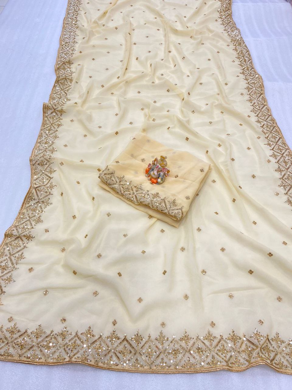 Cream Saree In Georgette Silk With Multi Sequence Work