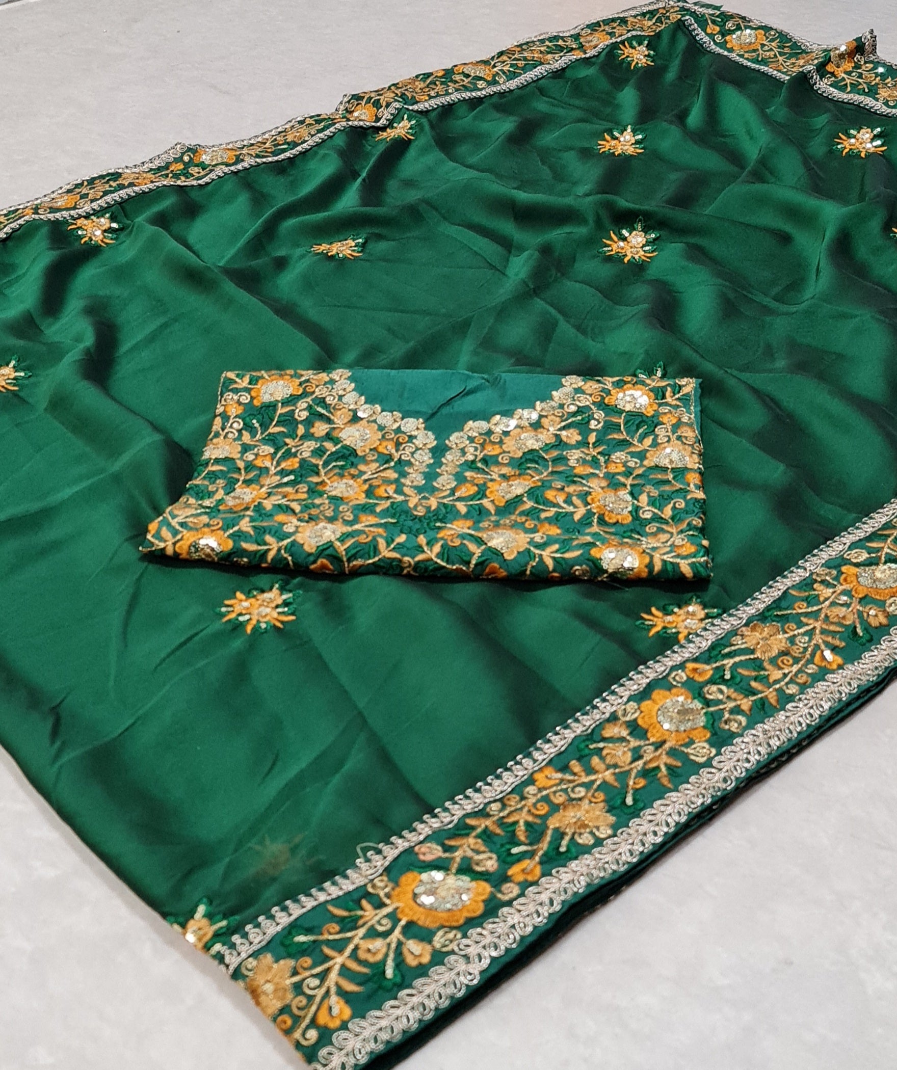 Dark Green Saree In Rangoli Georgette Silk With Fancy Thread Work