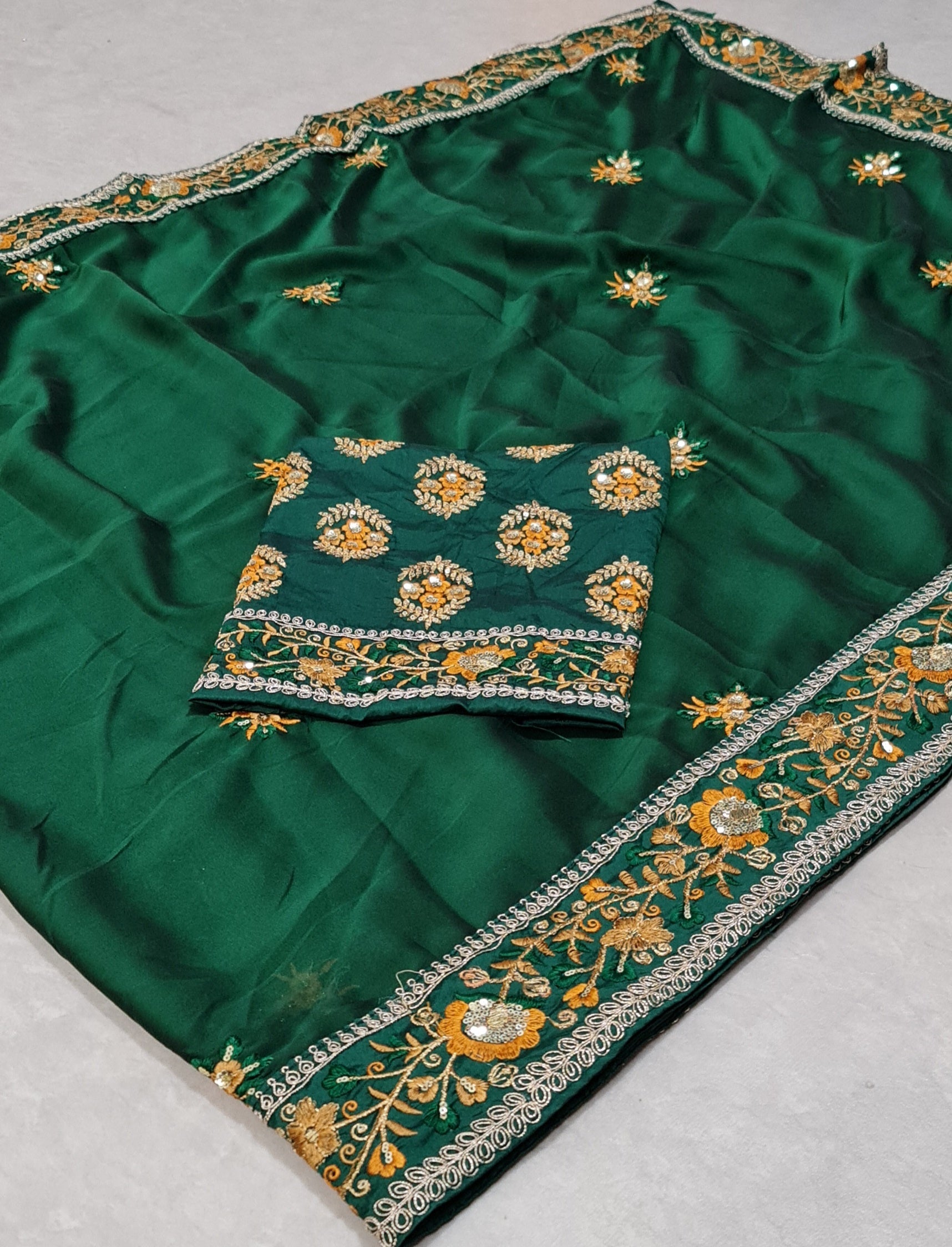 Dark Green Saree In Rangoli Georgette Silk With Fancy Thread Work