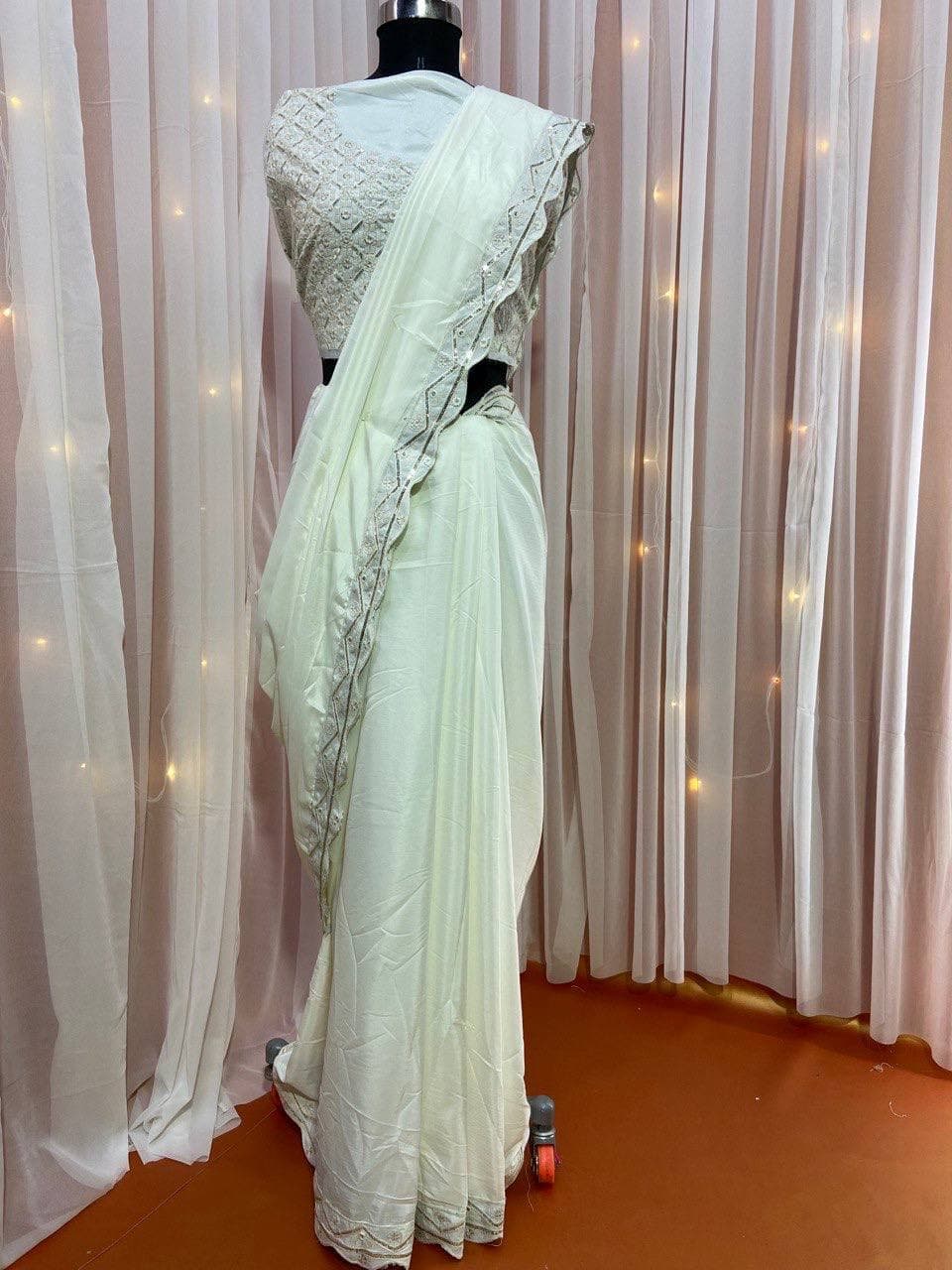 Off White Saree In Crape With Embroidery Work