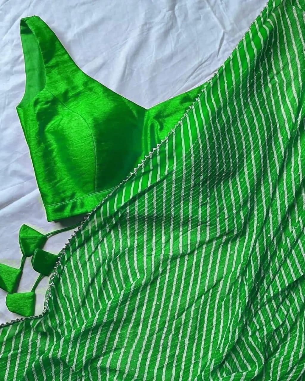 Parrot Green Saree In Georgette Silk With Laheriya Print