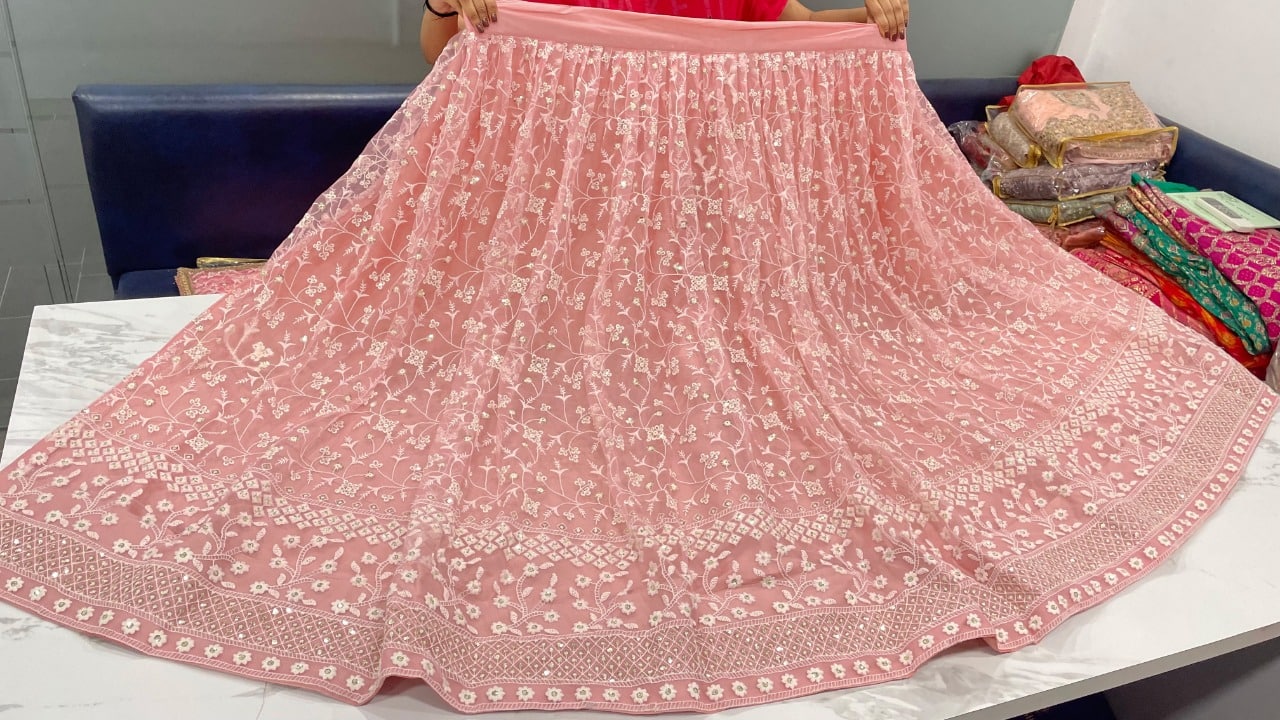 Peach Lehenga Choli In Nylon Mono Net With Sequence Work