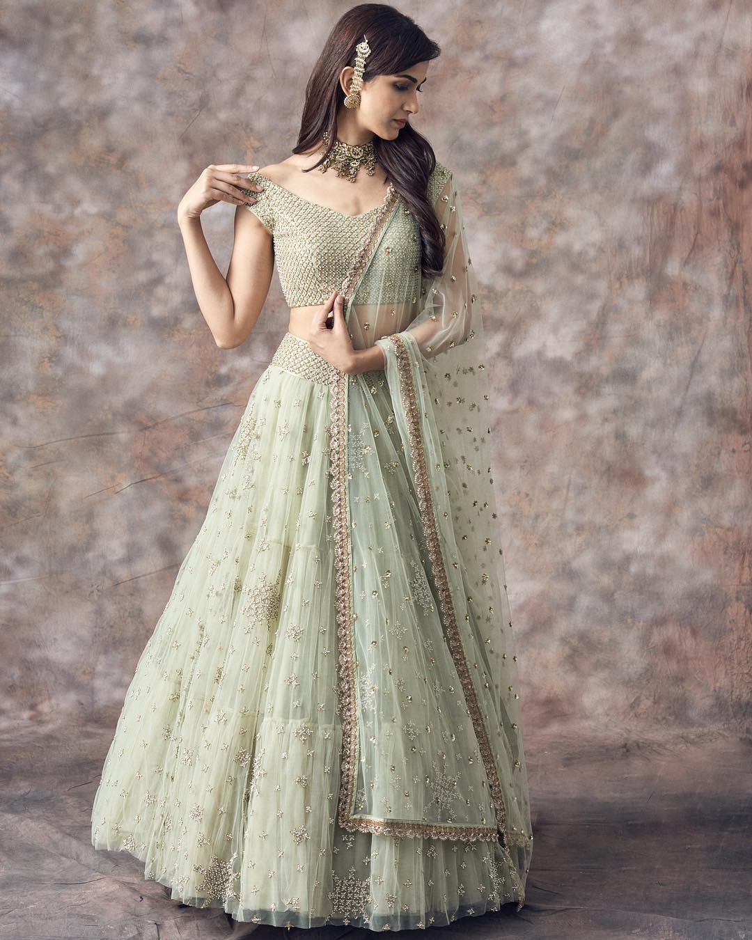 Pista Lehenga Choli In Net With Sequence Work