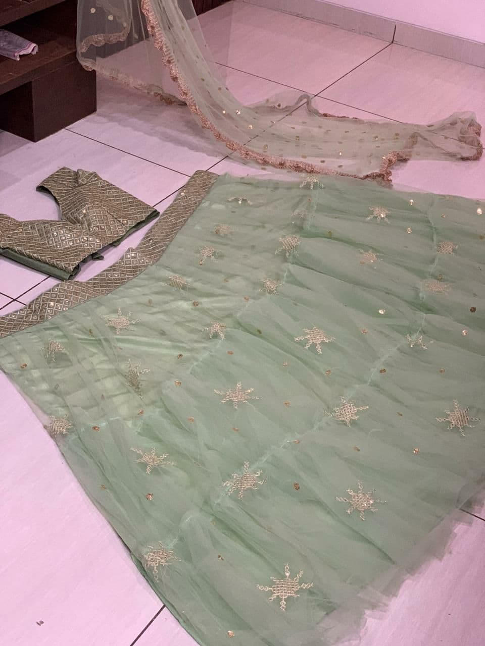 Pista Lehenga Choli In Net With Sequence Work