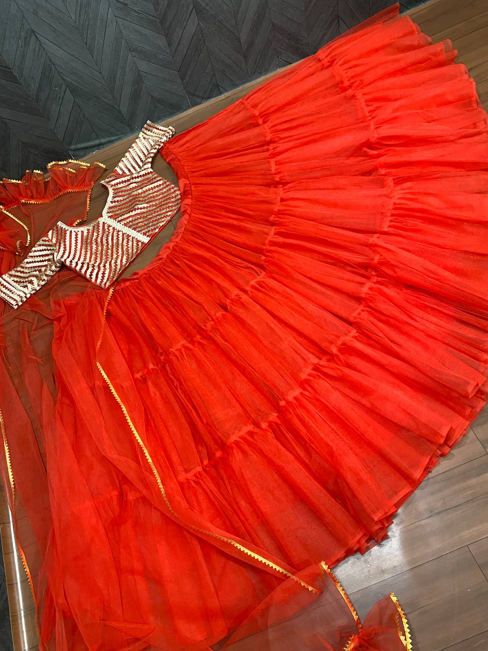 Red Lehenga Choli In Butterfly Mono Net With Ruffles