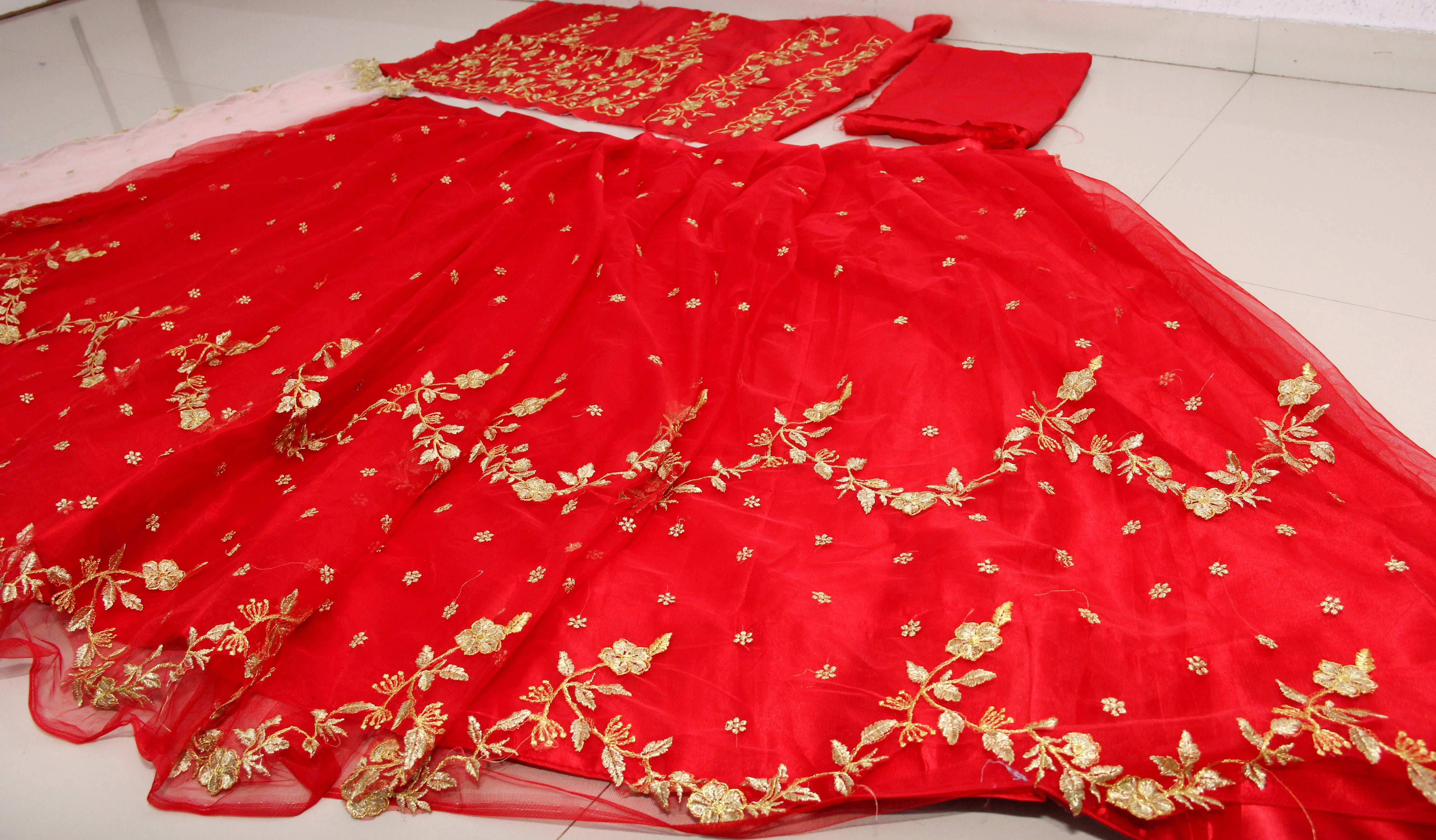 Red Lehenga Choli In Butterfly Mono Net With Badla Zari Work