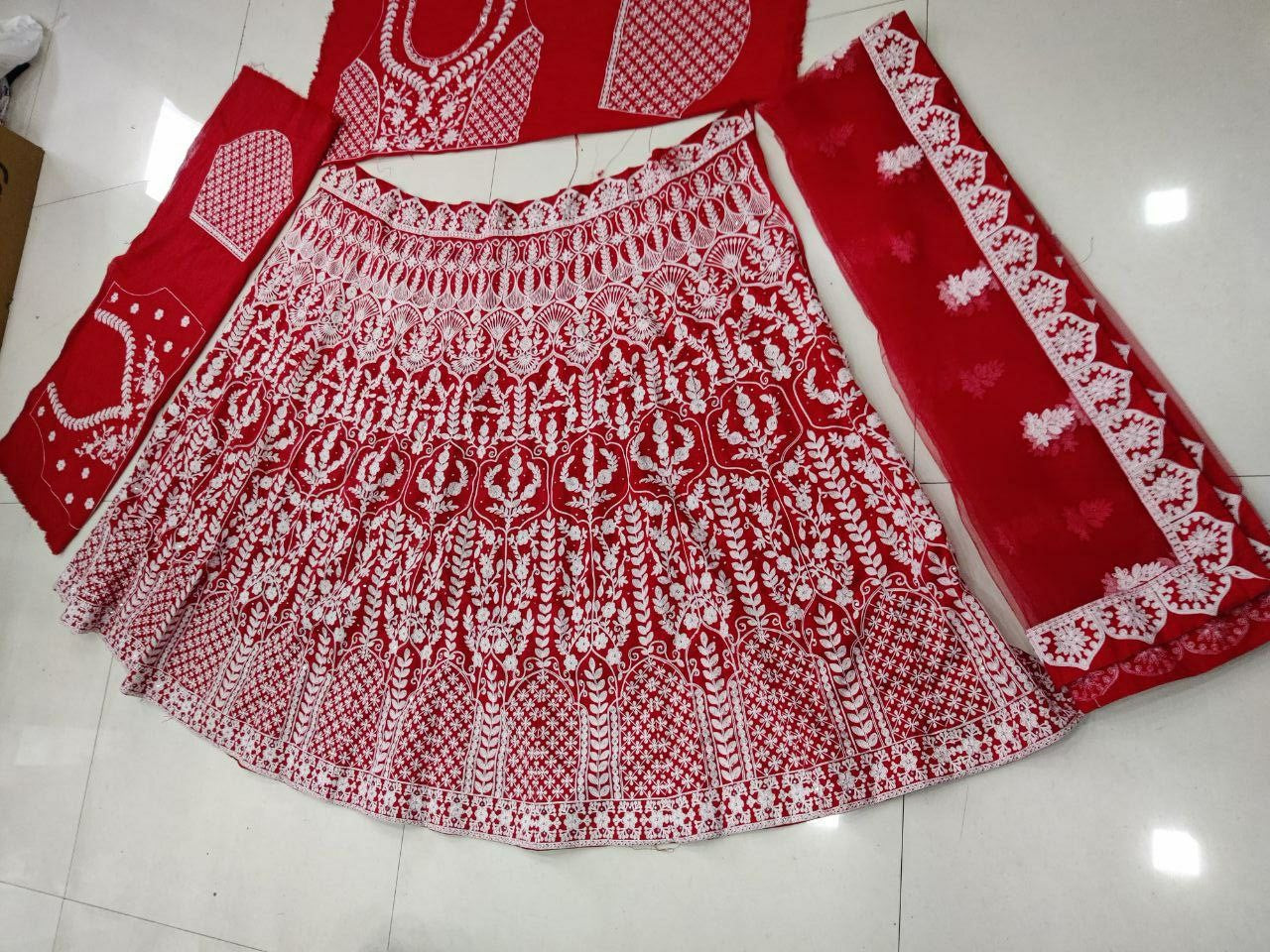 Red Lehenga Choli In Phantom Silk With Heavy Chain Stitch Work