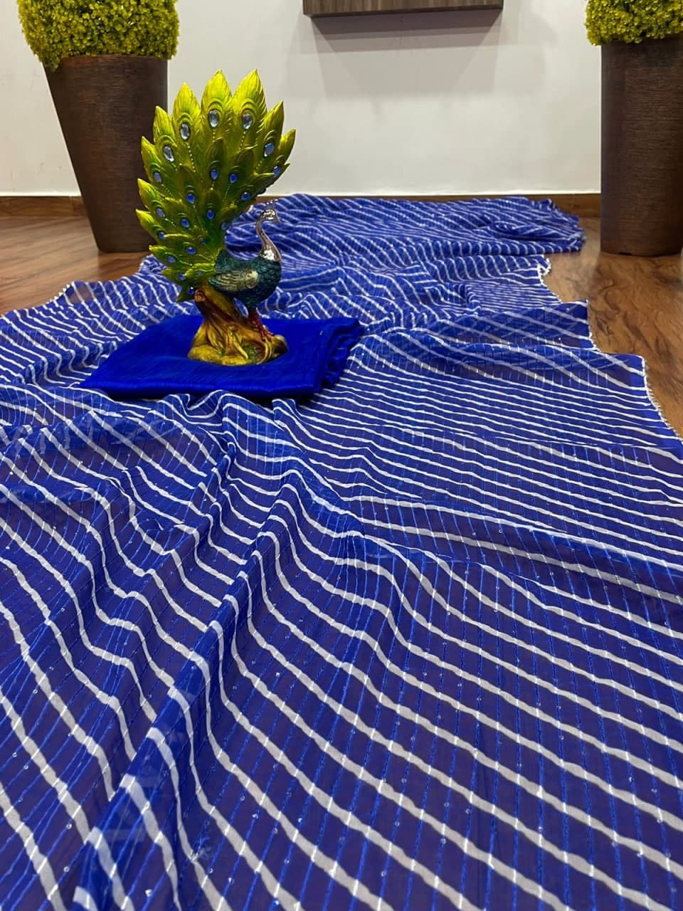 Royal Blue Saree In Georgette Silk With Laheriya Print