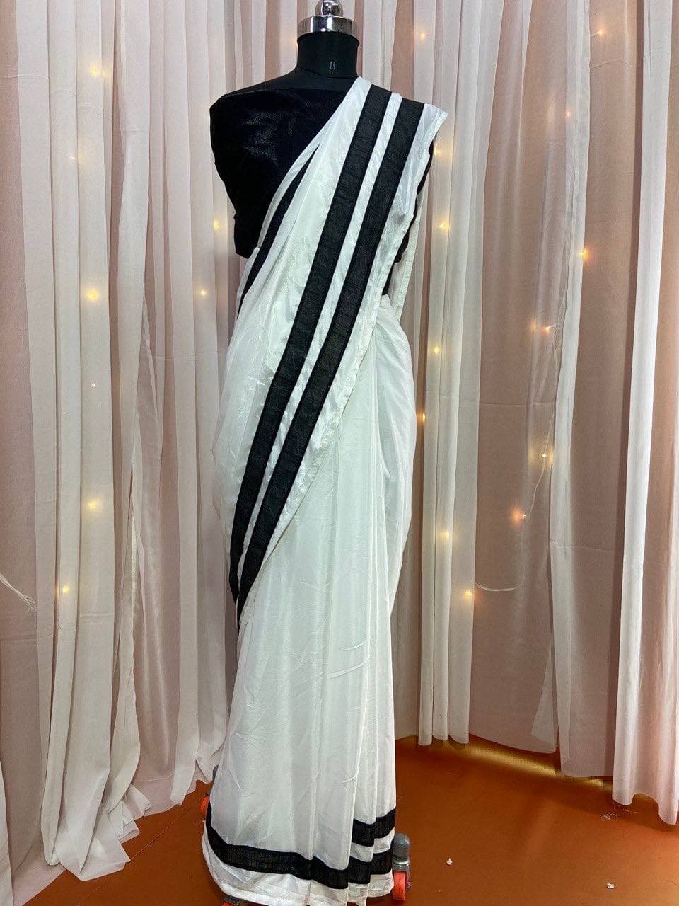 White Saree In Crape With Plain