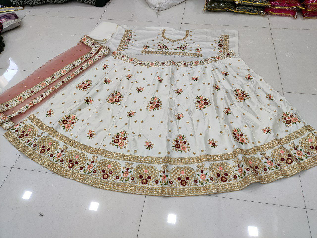 White Lehenga Choli In Georgette Silk With Multi Sequence Work