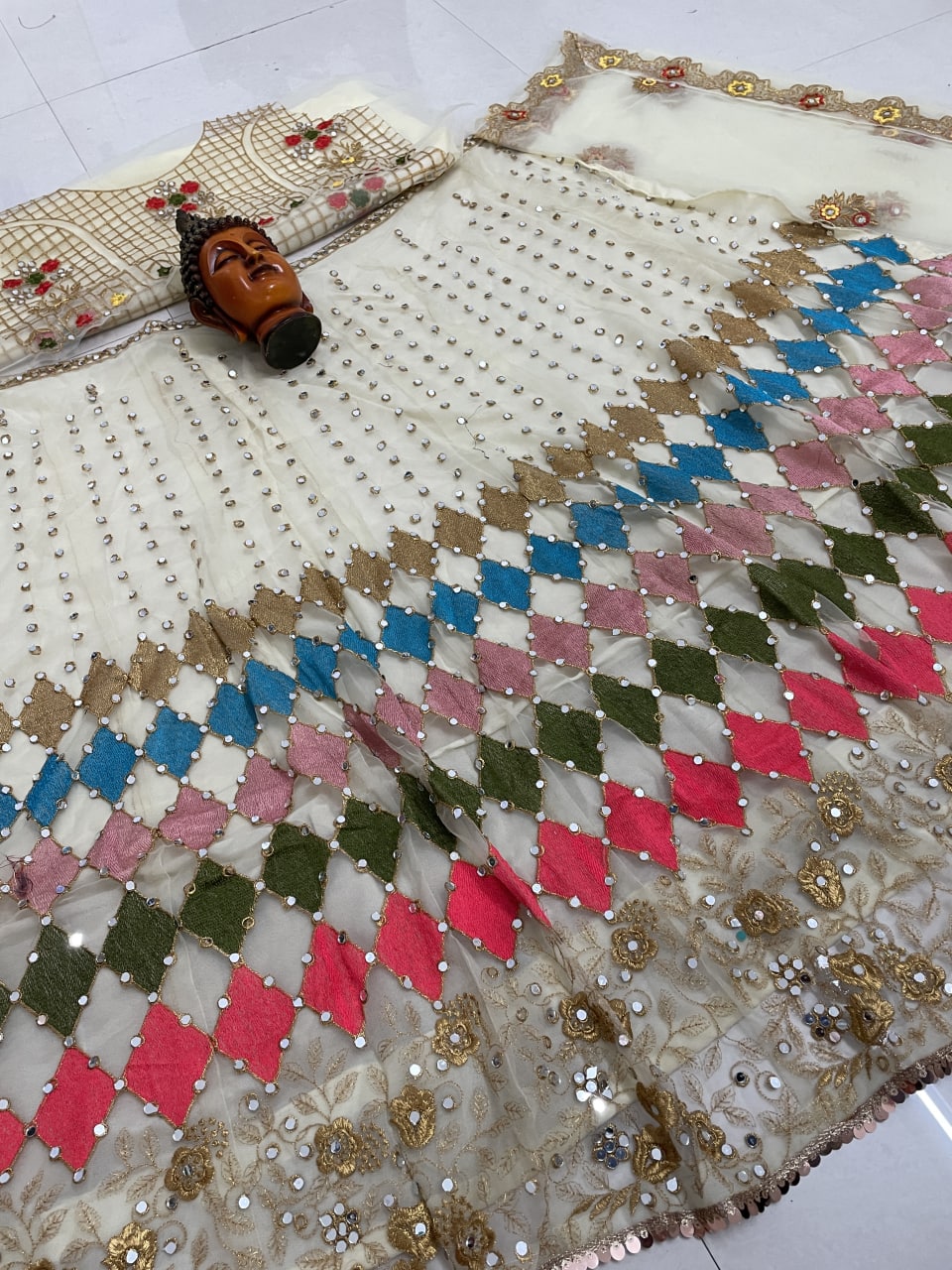 White Lelenga Choli In Nylon Mono Net With Embroidery Work