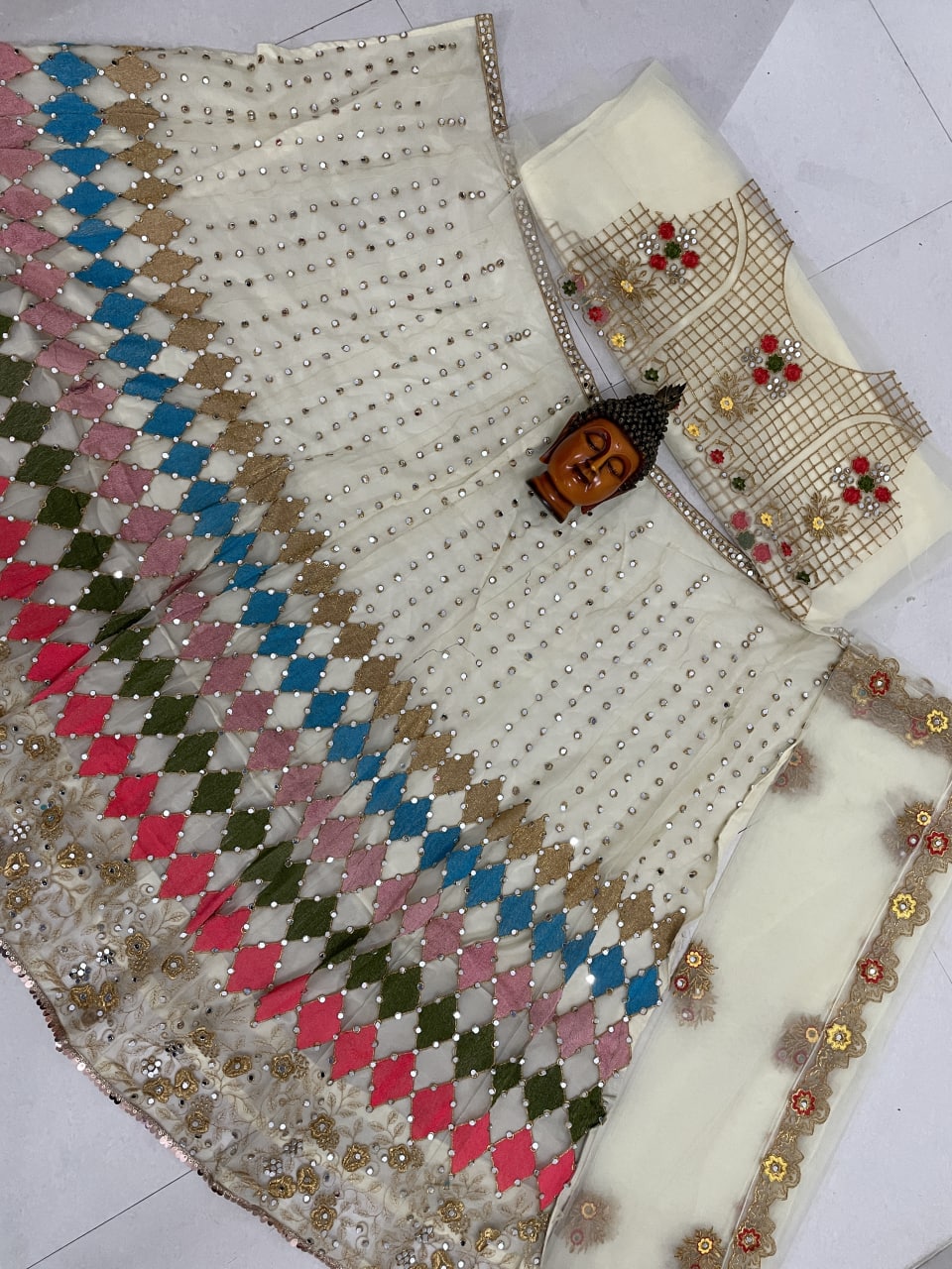 White Lelenga Choli In Nylon Mono Net With Embroidery Work