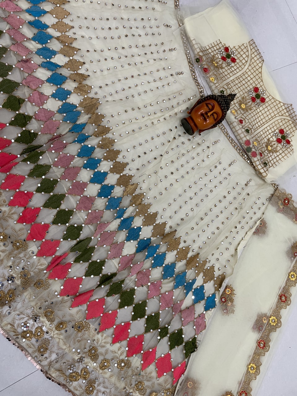 White Lelenga Choli In Nylon Mono Net With Embroidery Work