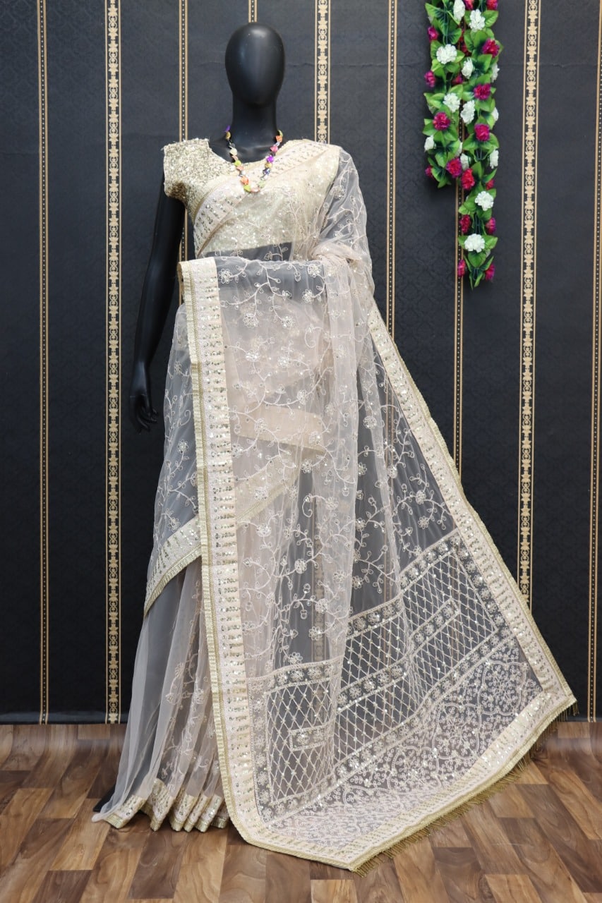 White Saree In Nylon Mono Net With Sequence Work