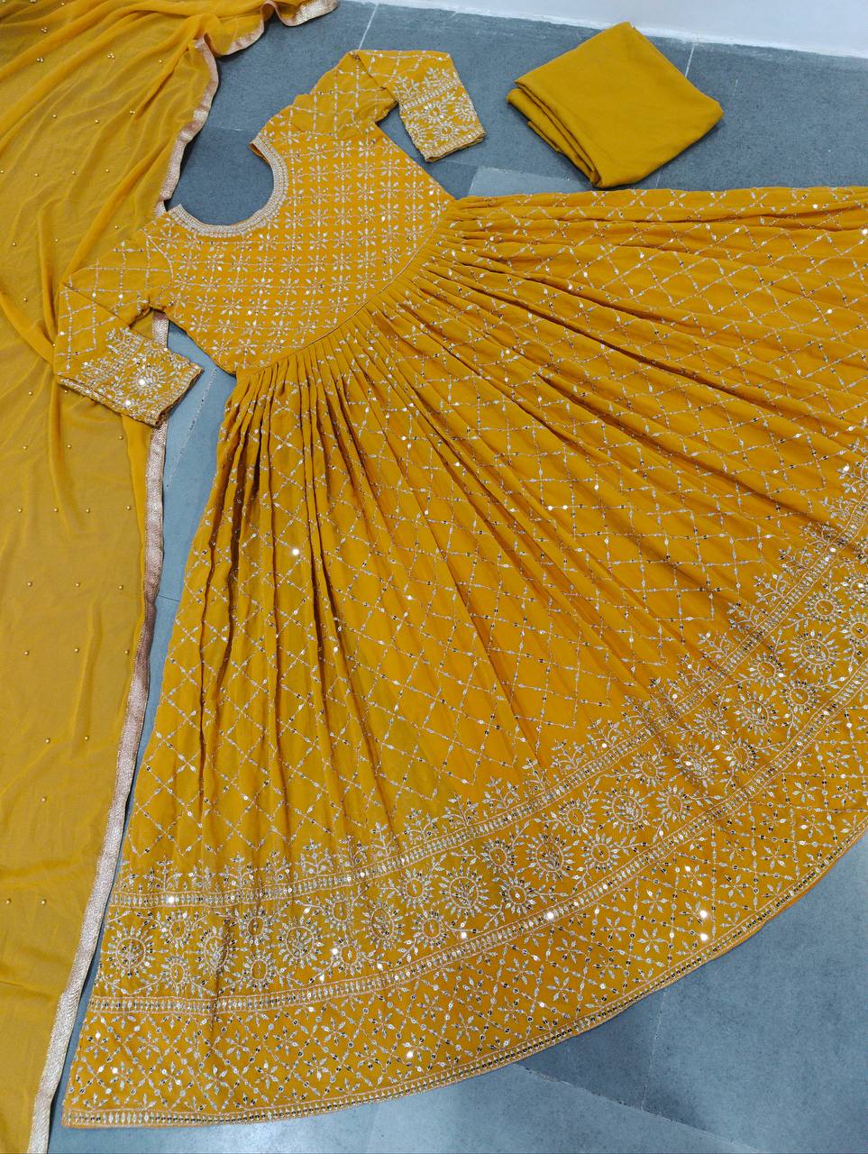 Yellow Gown In Faux Georgette With Heavy Sequence Embroidery Work