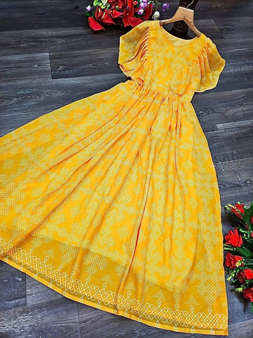 Yellow Georgette Silk Muggu Printed Gown