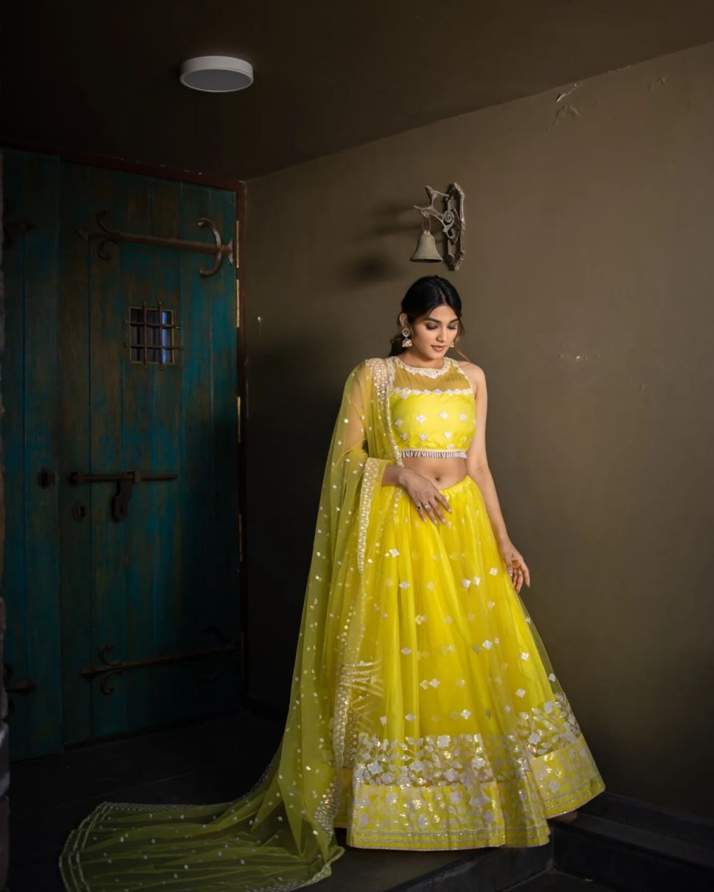 Yellow Lehenga Choli In Nylon Mono Net With Embroidery Work