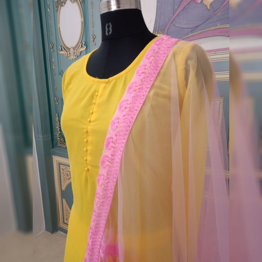 Yellow Salwar Suit In Georgette With Potli Button