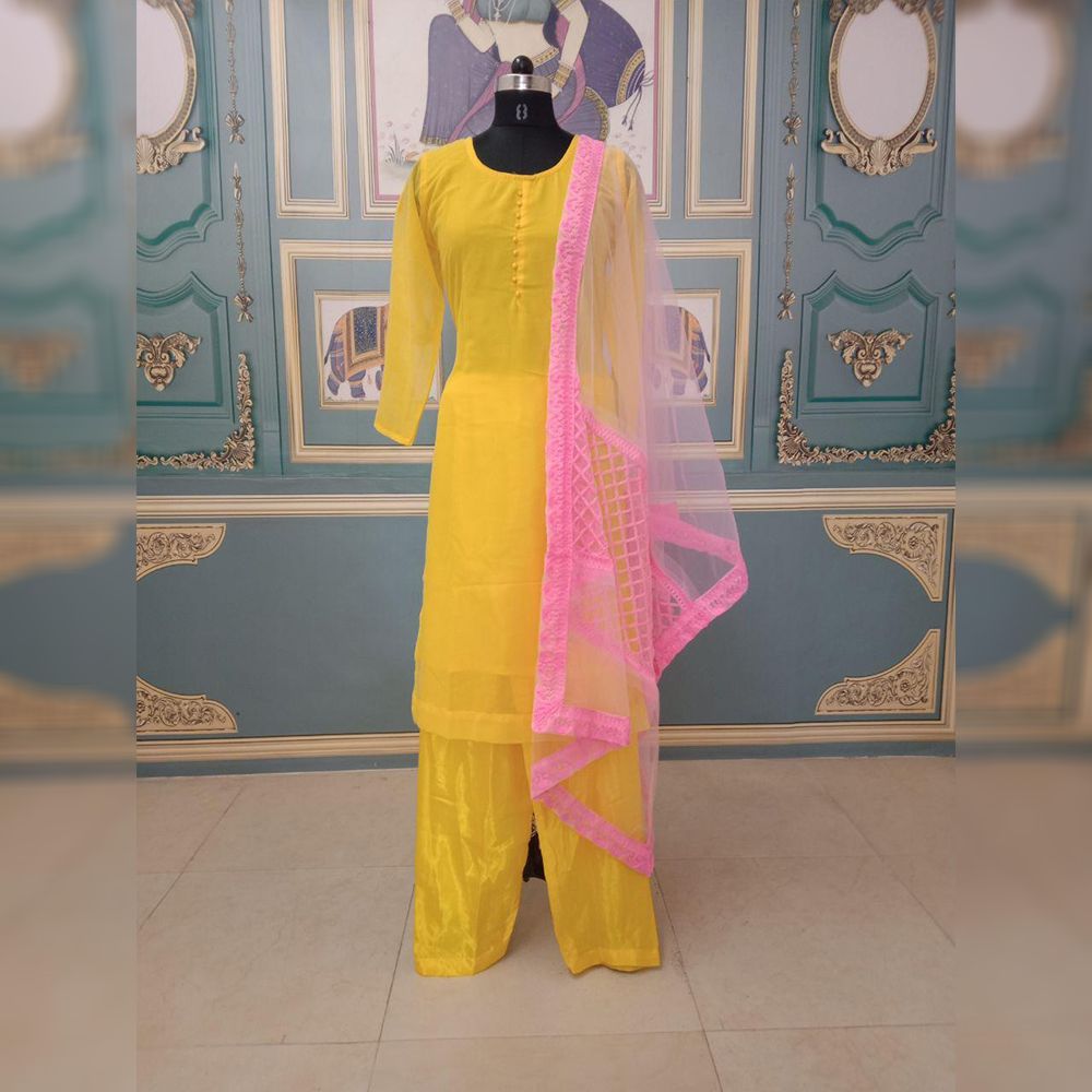 Yellow Salwar Suit In Georgette With Potli Button