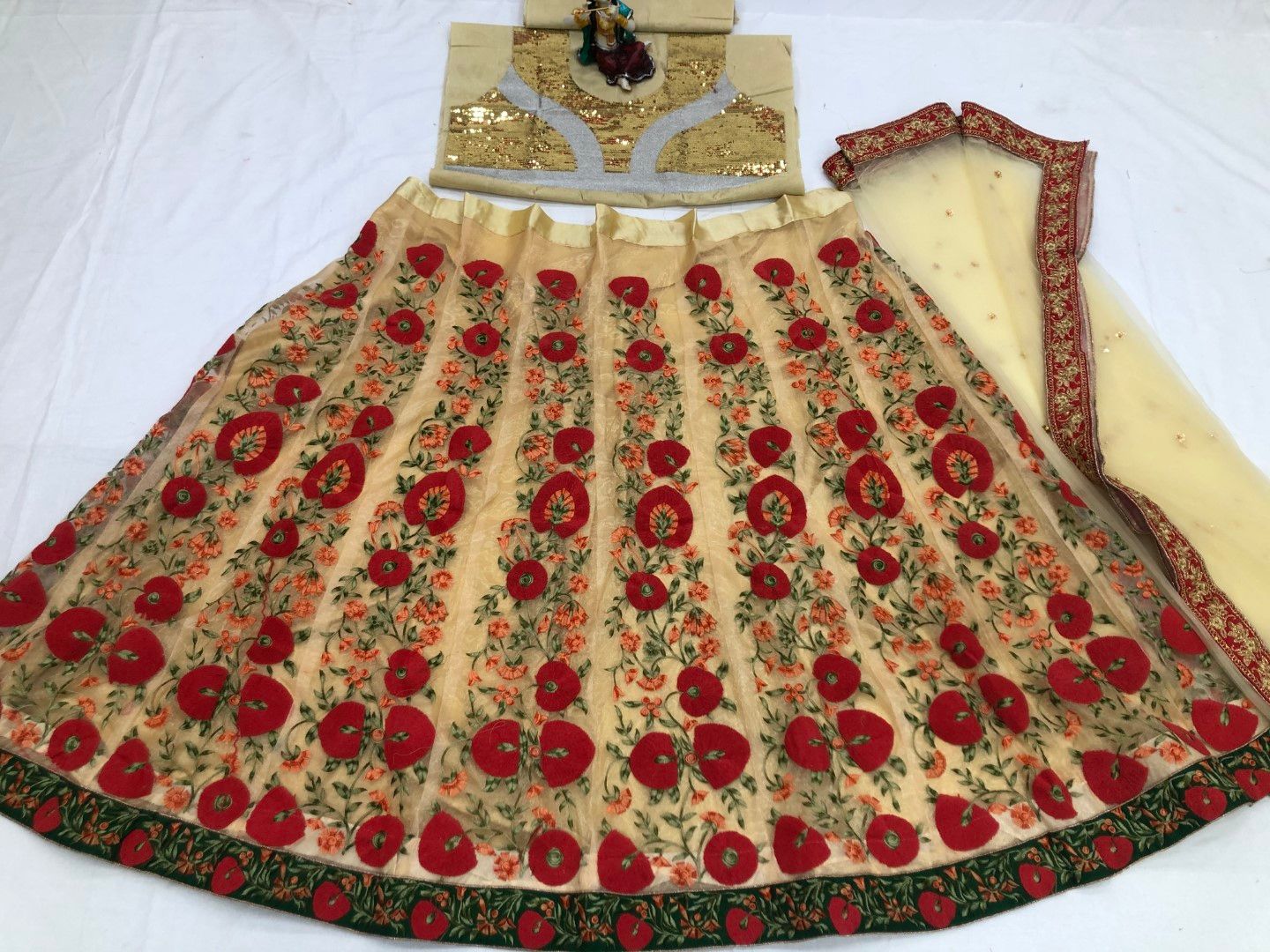 Cream Lehenga Choli In Nylon Mono Net With Embroidery Work