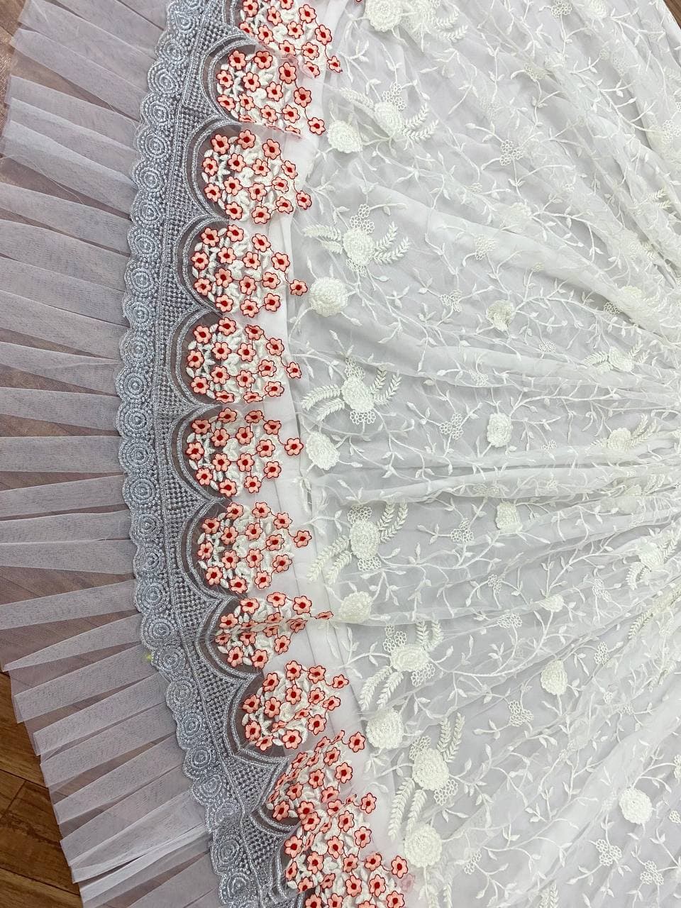 White Lehenga In Nylon Mono Net With Multi Needle Work