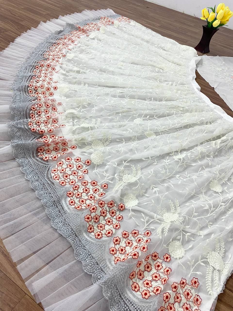 White Lehenga In Nylon Mono Net With Multi Needle Work