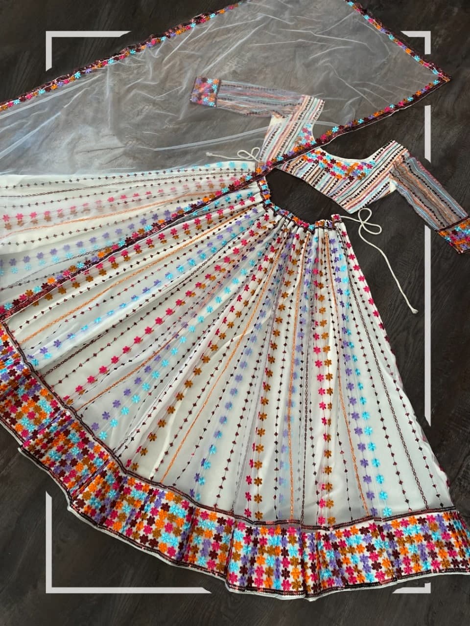 White Lehenga Choli In Nylon Mono Net With Multi Embroidery Work