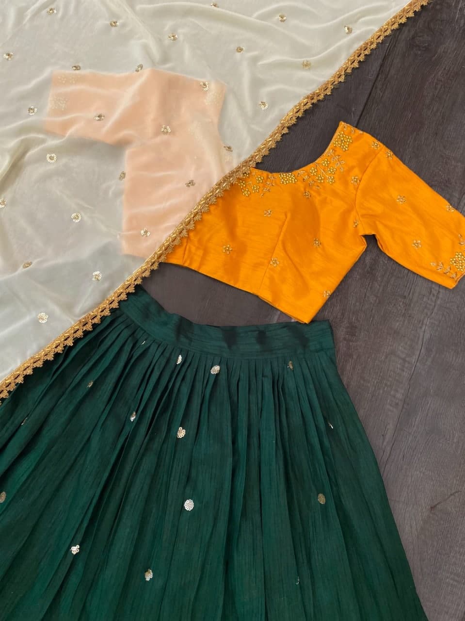 Dark Green Lehenga Choli In Mono Benglori Silk With Sequence Embroidery Work