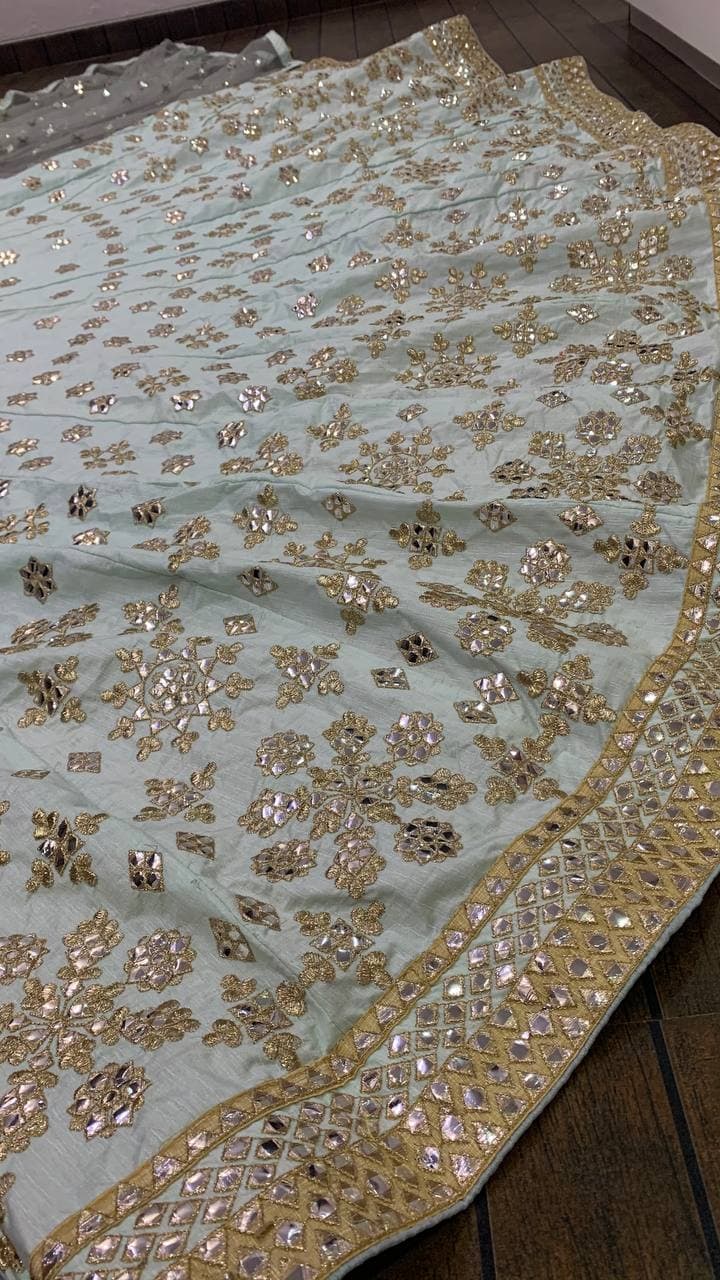 Aqua Lehenga Choli In Malbari Silk With Mirror Work