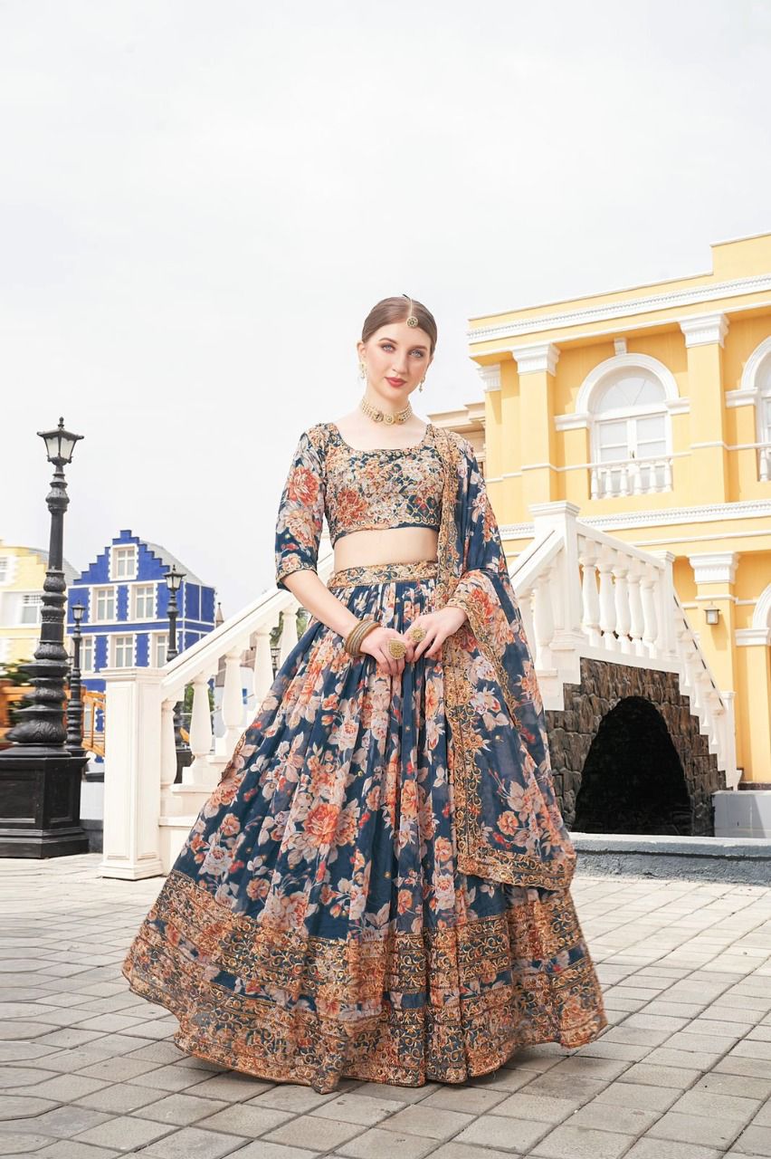 Rama Lehenga Choli In Organza Silk With Embroidery Work